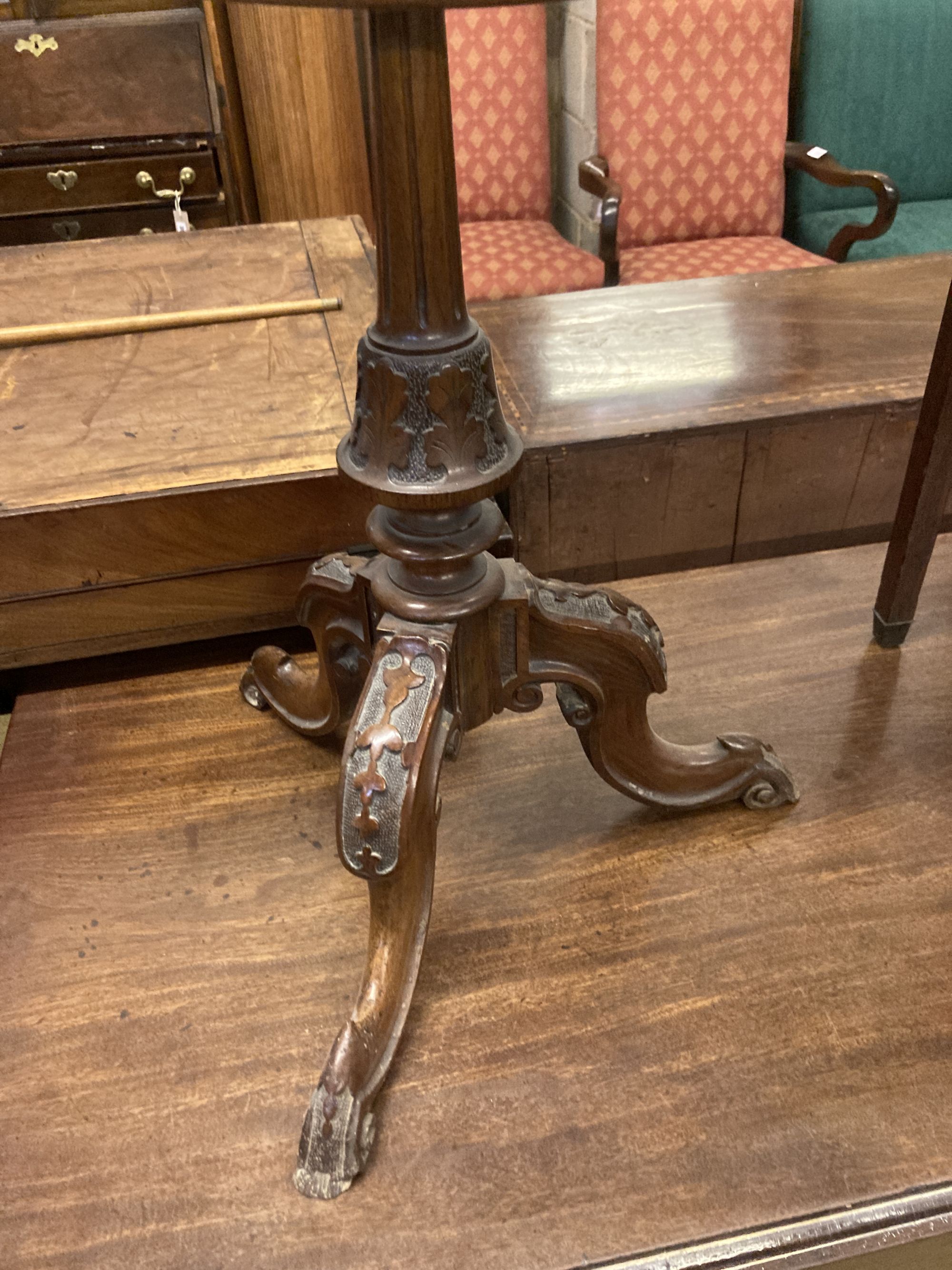 A Victorian polescreen, height 150cm